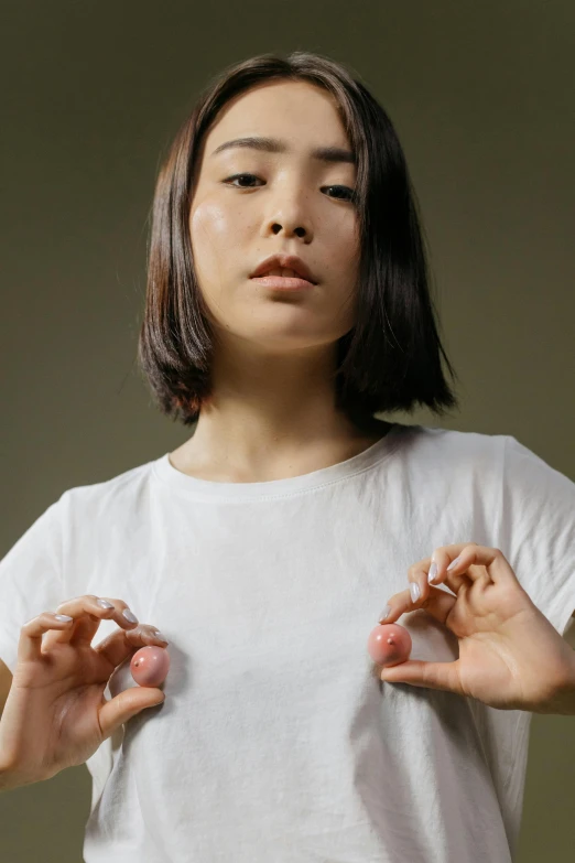 a woman holding a pair of scissors in her hands