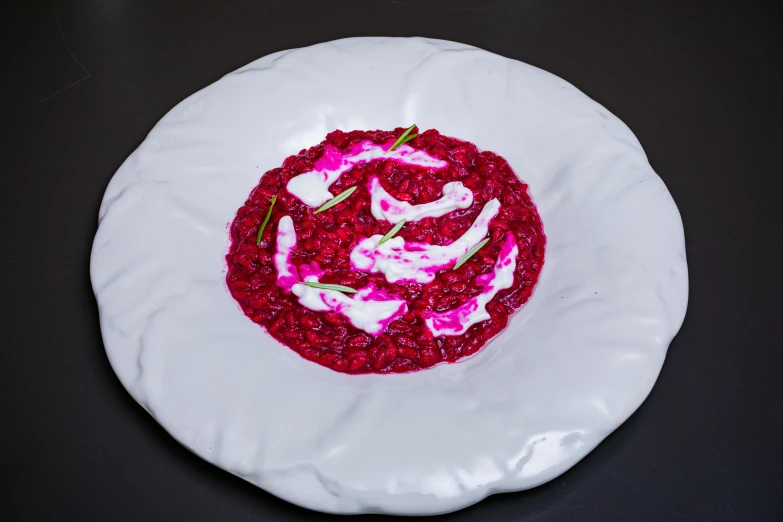 a white plate topped with a large cake