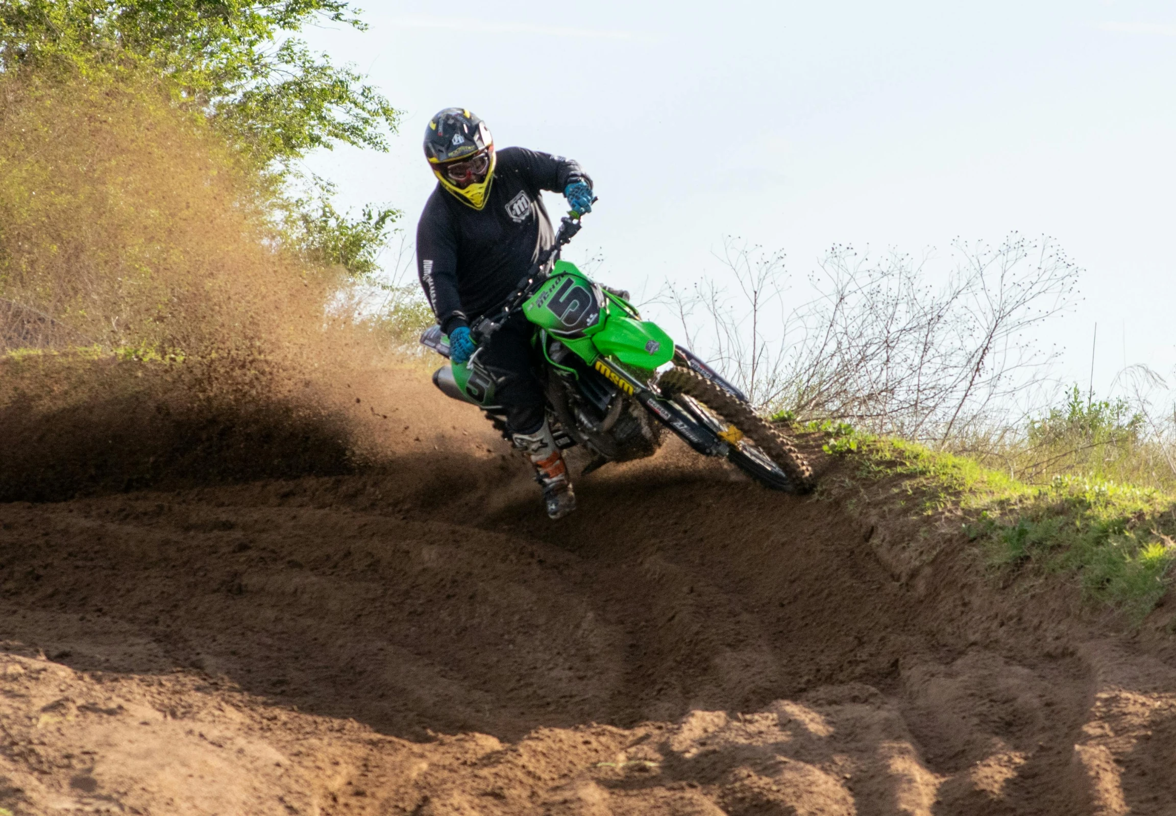 a person on a dirt bike in the mud