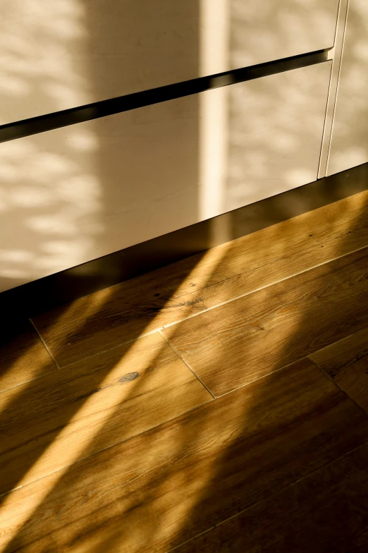 the floor is very shiny on top of a wooden floor