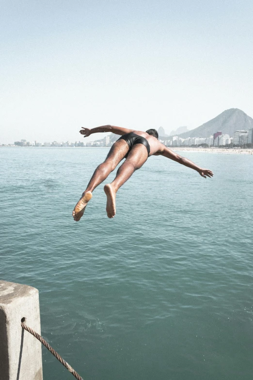 a female floating in the water on her body