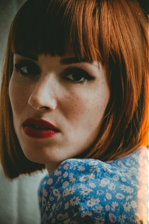 a close up of a person with short hair