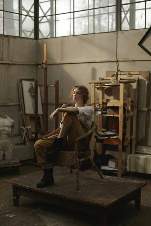 a woman sitting on top of a chair