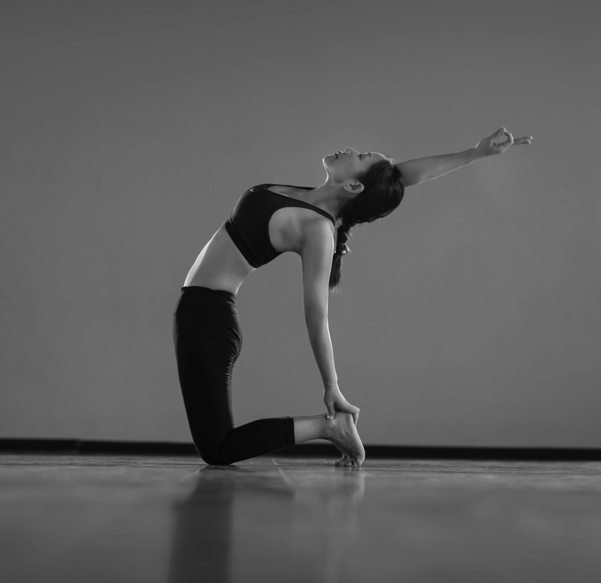 a woman practicing an inverted dance position