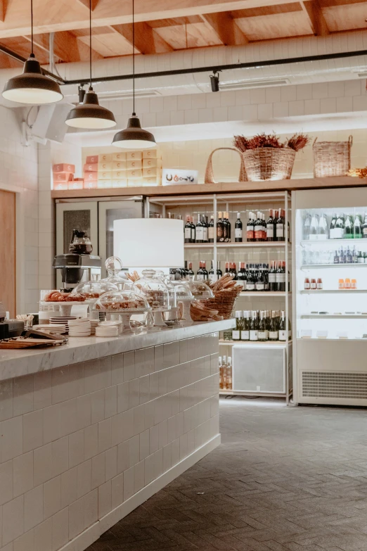 an image of a restaurant with shelves full of drinks