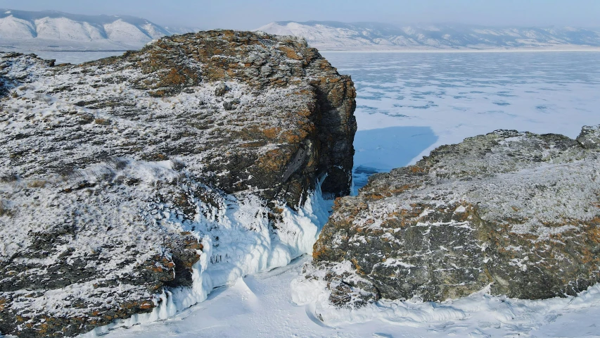 a group of mountains with snow and ice covering them