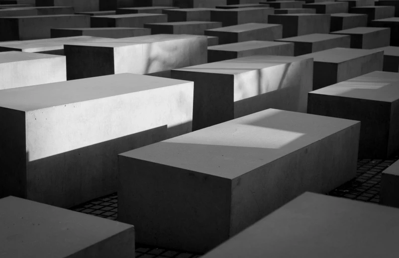 a bunch of concrete blocks arranged in different sizes and shapes