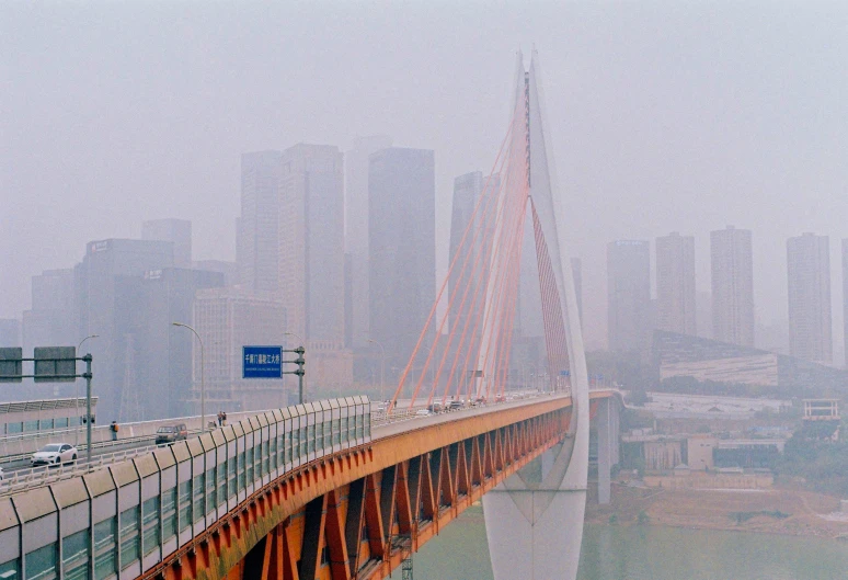 fog in the city, with skyscrs and traffic on it