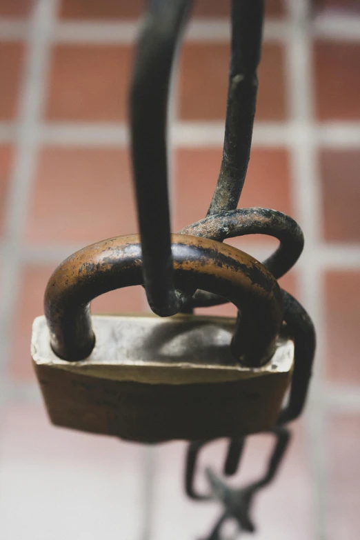 a close up of a iron gate on the ground