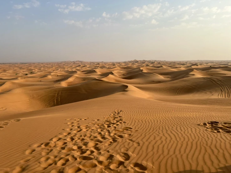 the sand of an empty desert covered in sand