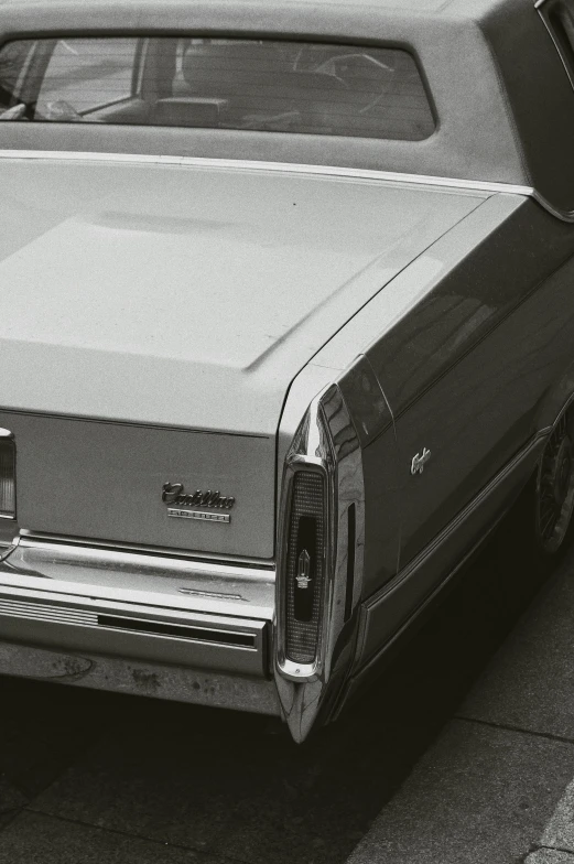 a black and white image of an old car