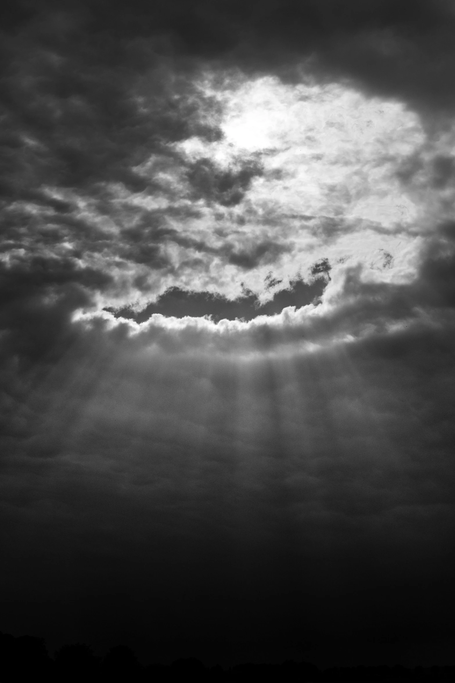 an airplane flying high above the clouds in the sky