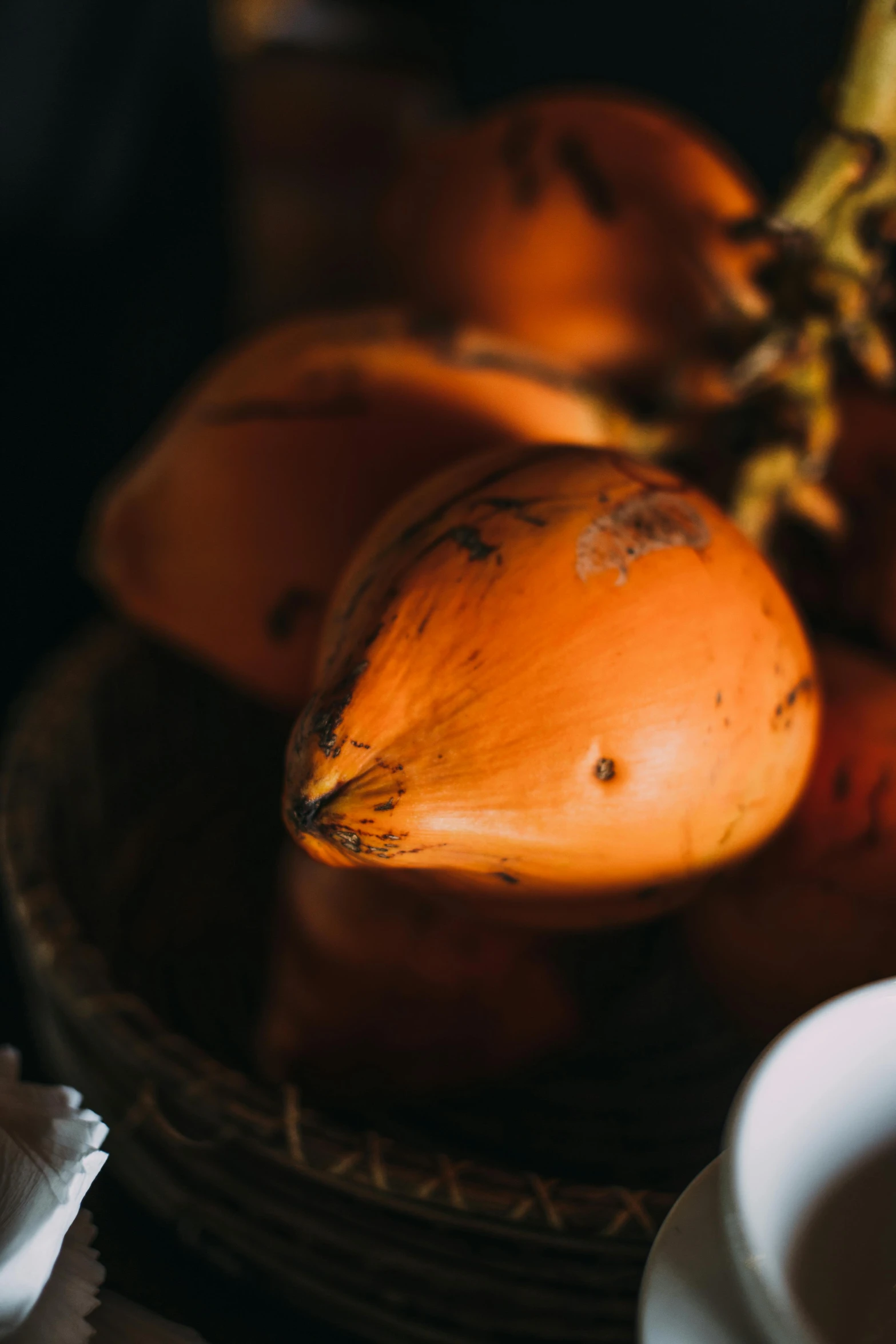 the fruit is sitting in a brown basket