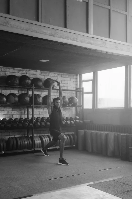 an athlete exercising in a squat room