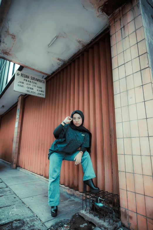 there is a woman sitting on a chair smoking