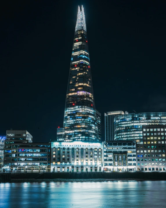 an image of a city at night taken from the water