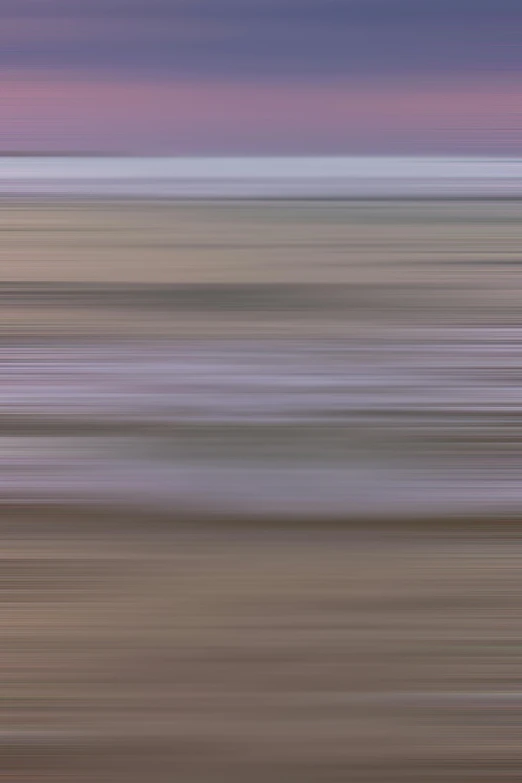 a long exposure of pink gray and purple