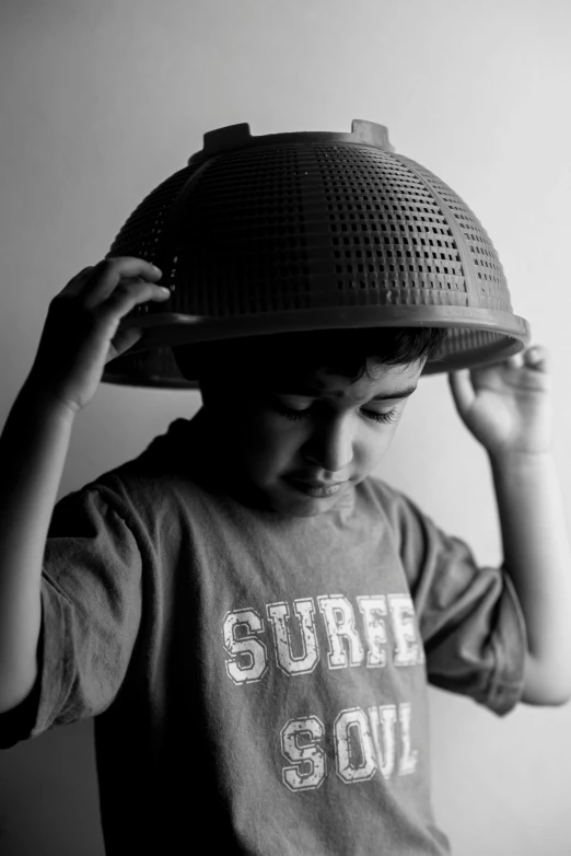 a small child with a helmet on his head