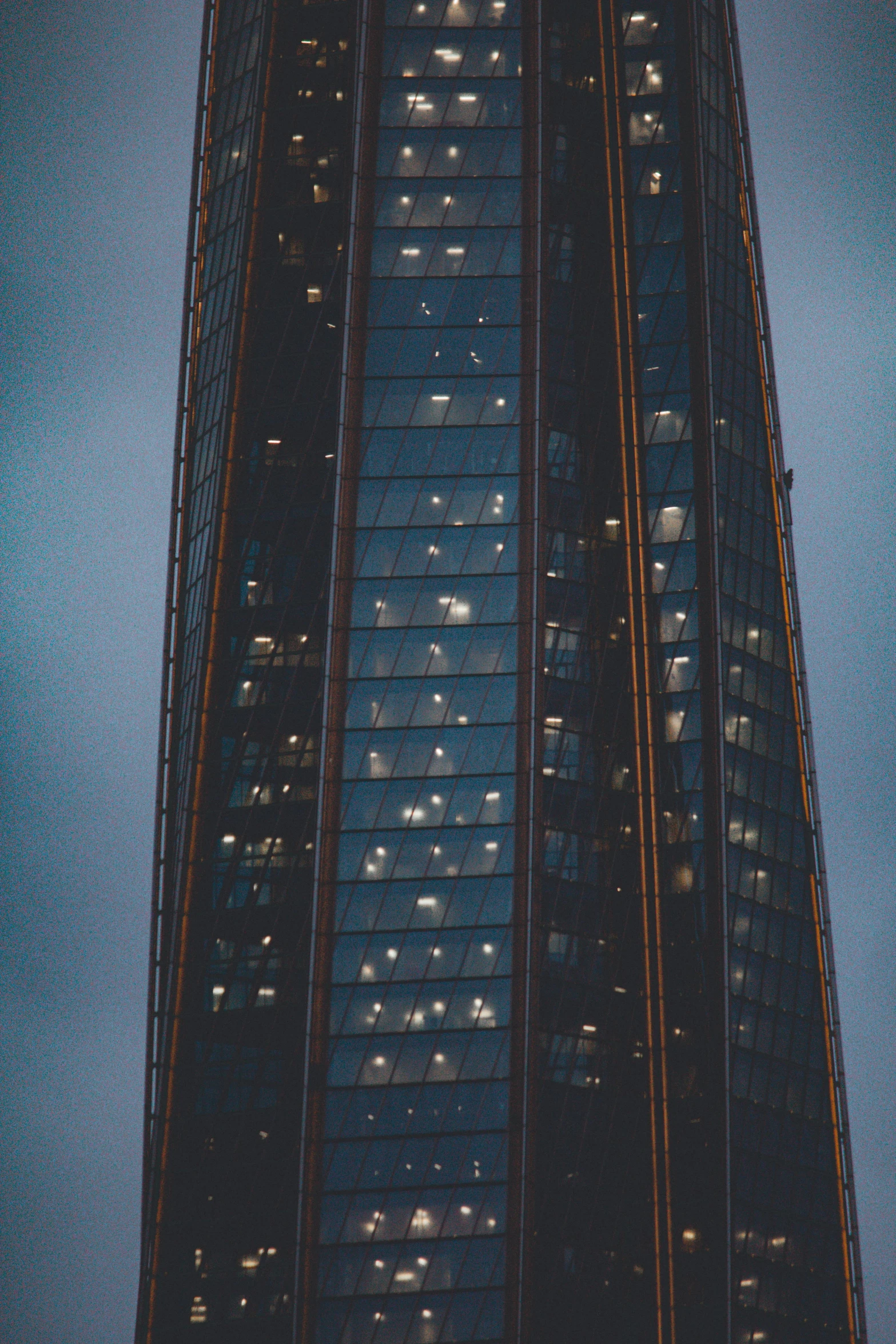 a large building in the dark lit up at night