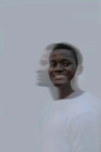 an african american male wearing a white shirt