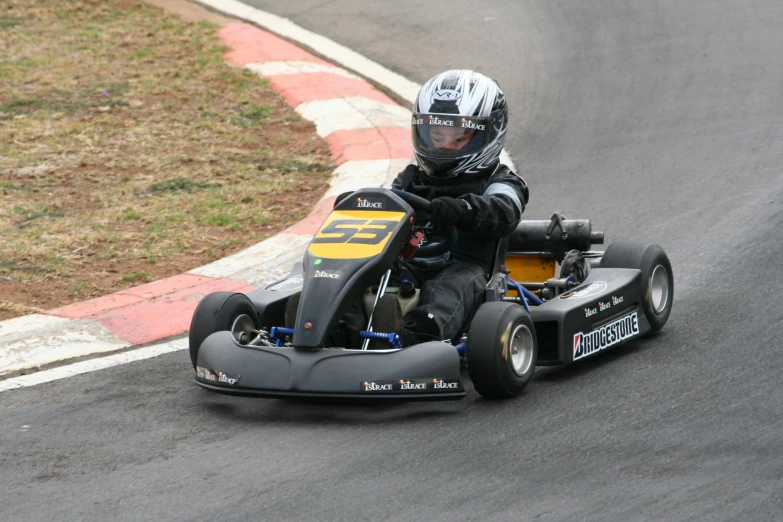 a man riding on top of a bumper car