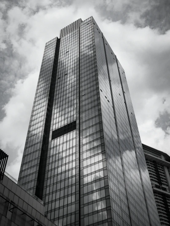 black and white pograph of a skyscr with very large windows