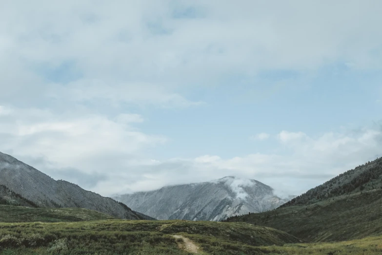 some very pretty mountains with green plants