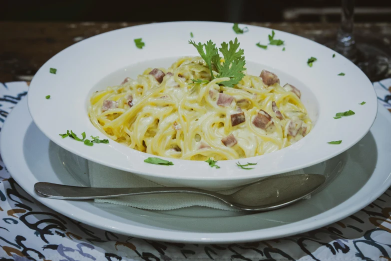 the plate is full of food with noodles in it