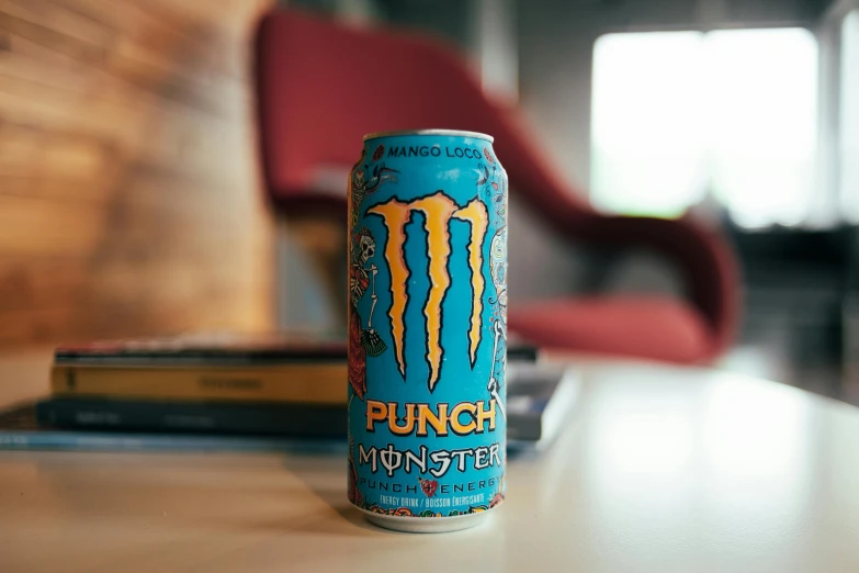 a can of punk energy drink on a table