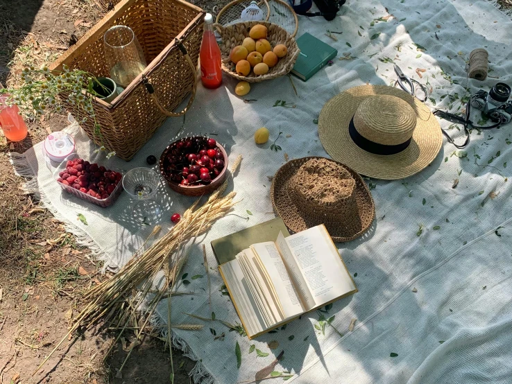 a table with books and hats on it