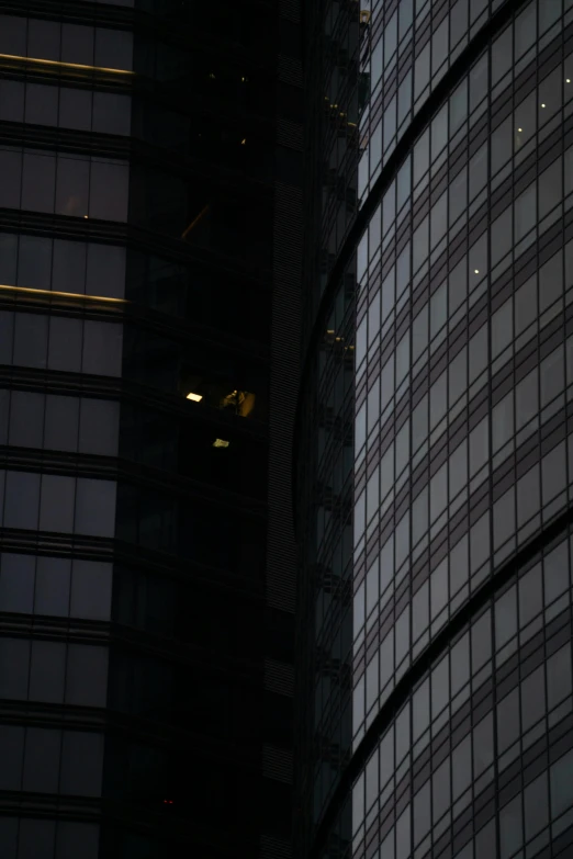 a clock is seen on a tall building