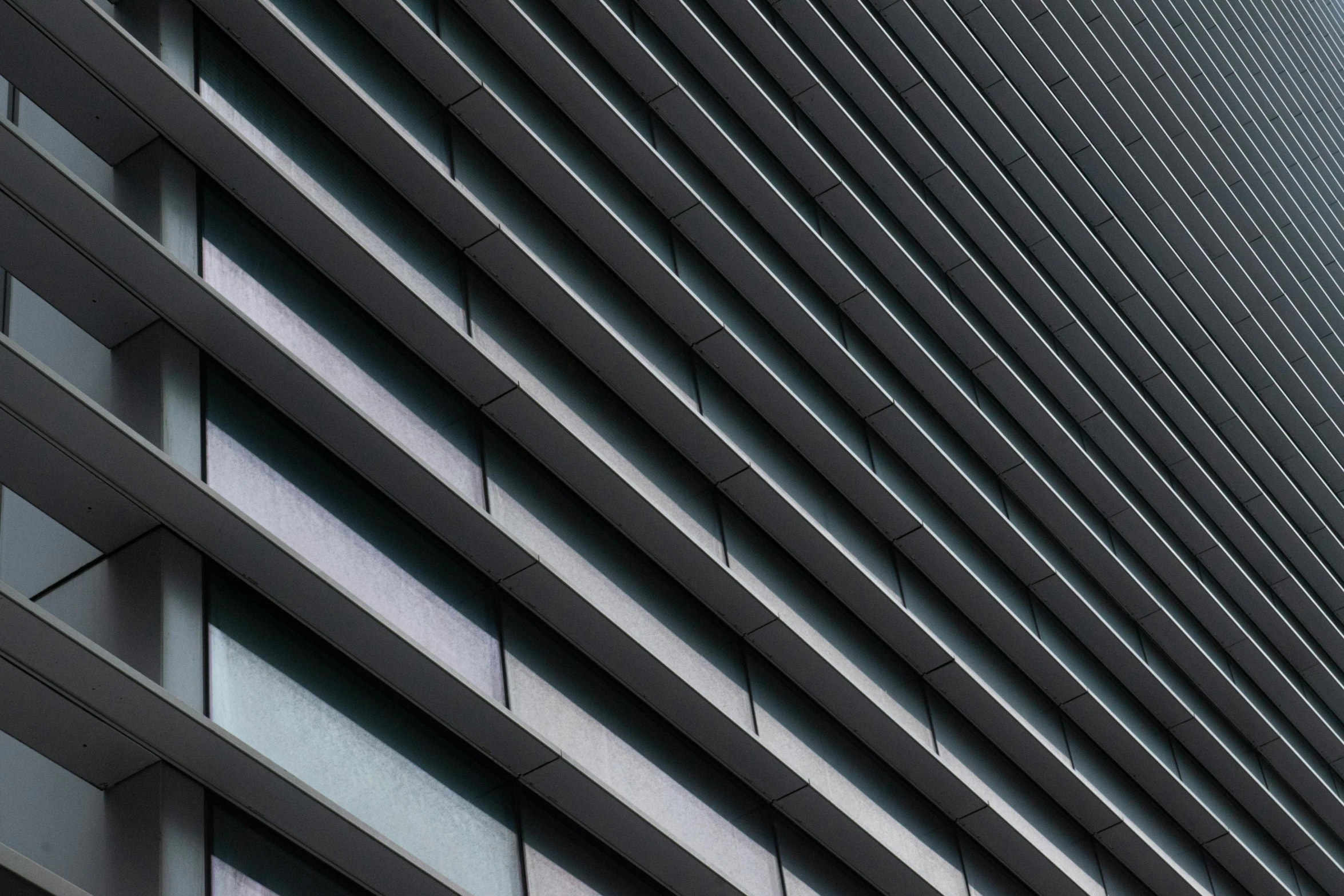 close up s of a building facade made up of many different windows