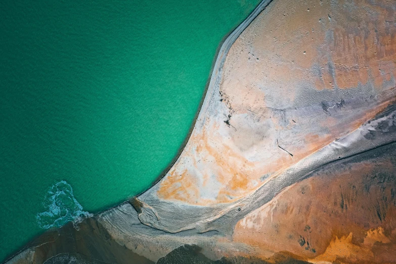 a large body of water near a cliff