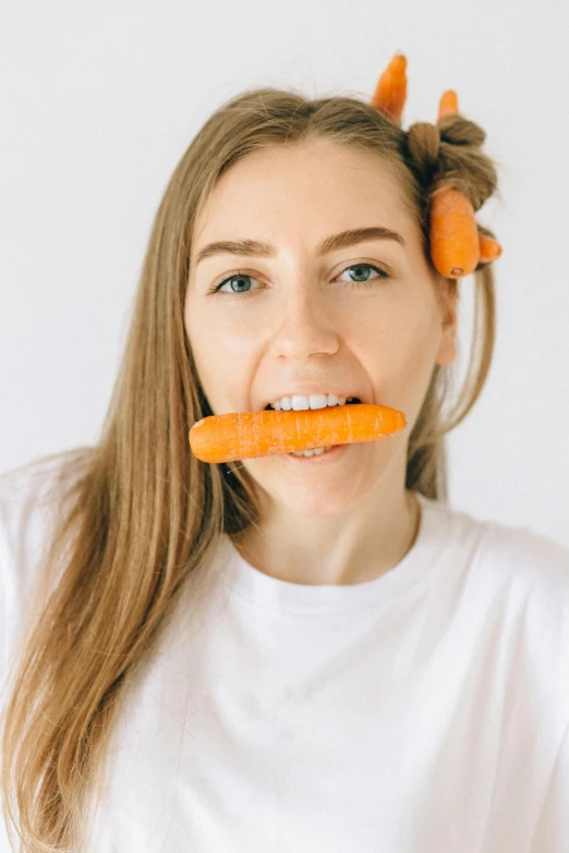 a girl with two carrots in her hair