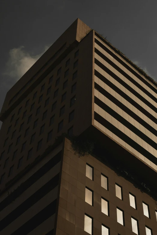 an upward view of a modern looking building