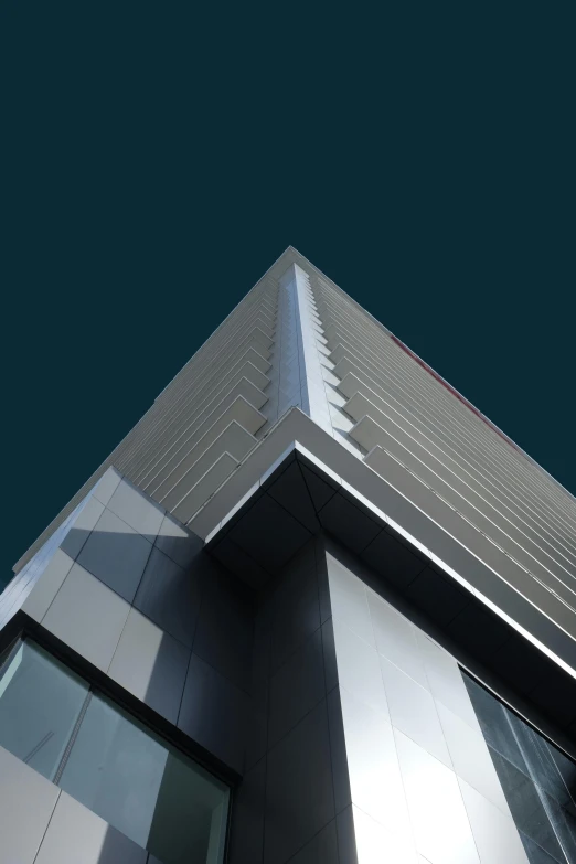 the exterior of a tall, shiny building