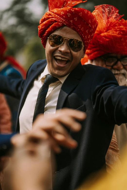 man in costume on the street near others