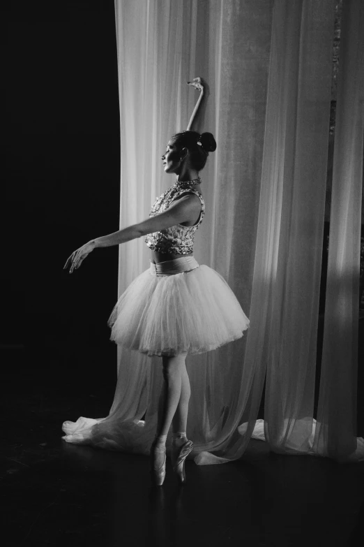 the dancer is posing for a black and white po