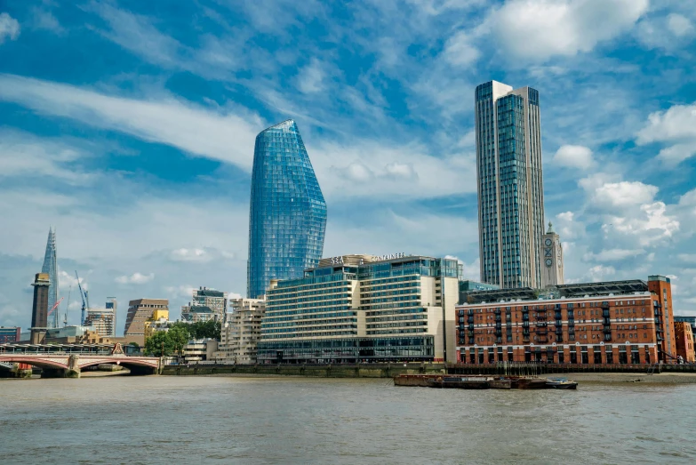 the city of london on a partly cloudy day