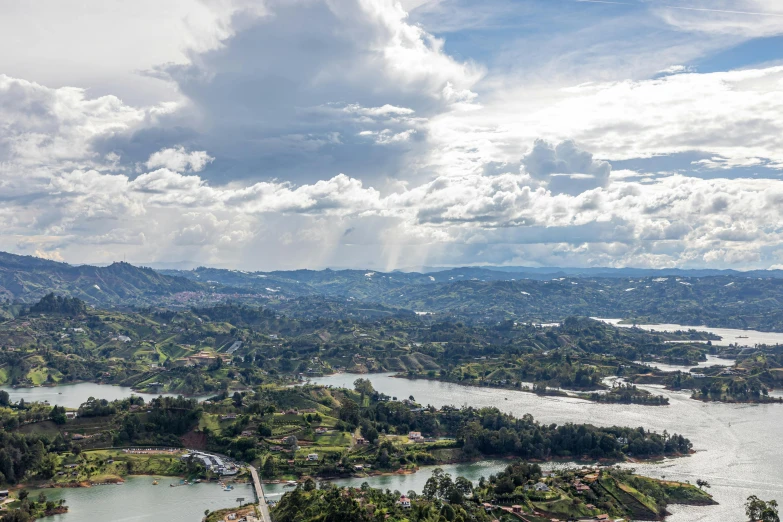 an aerial view of the lakes and a city