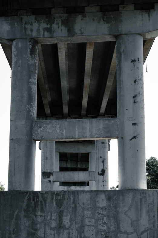 a truck is on the street below a bridge