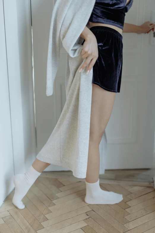 a woman is drying off in the bathroom