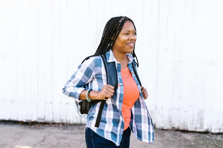 an african american woman smiling outside