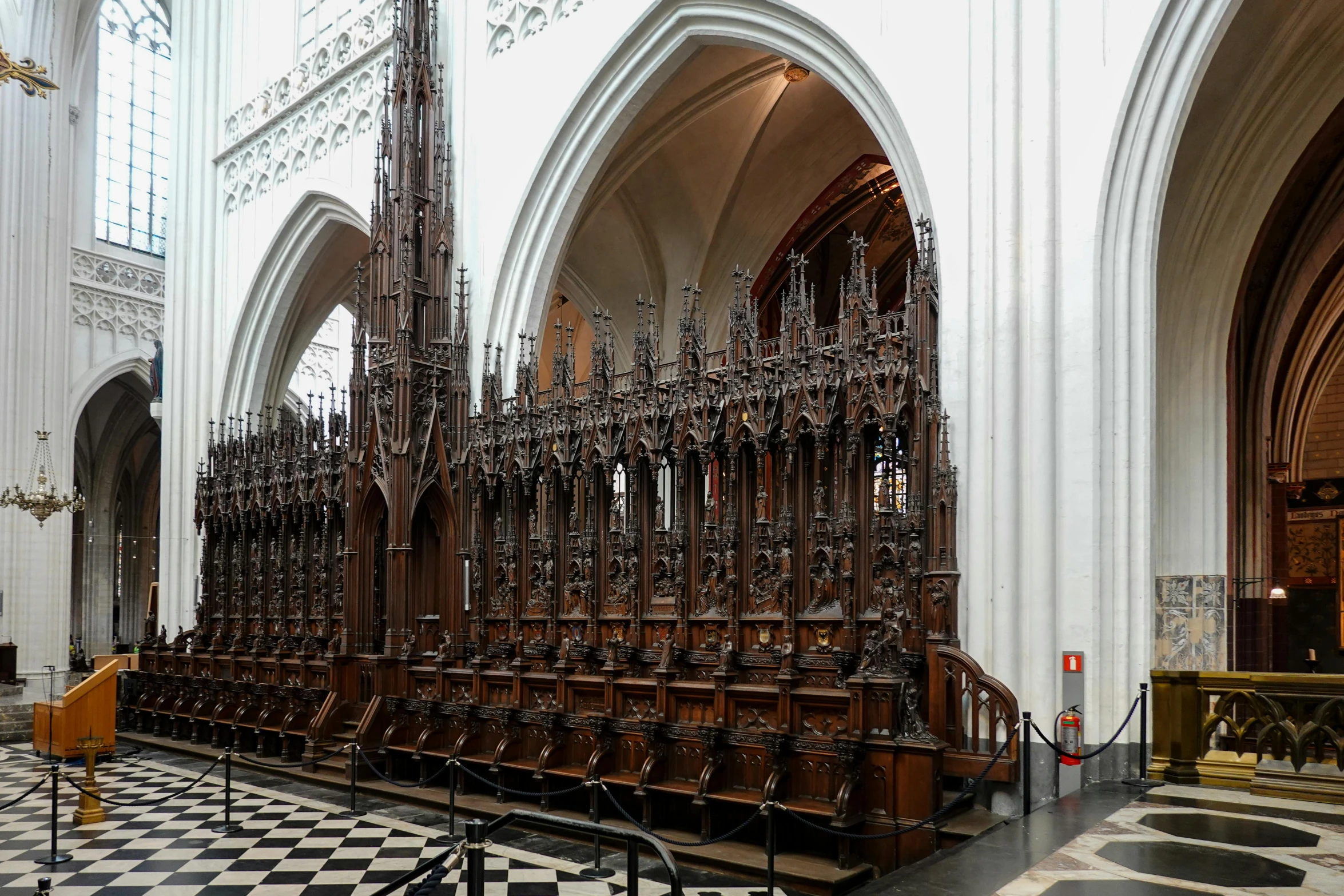 the elaborately designed wooden organ in a cathedral
