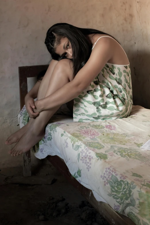 an image of a girl laying on her bed