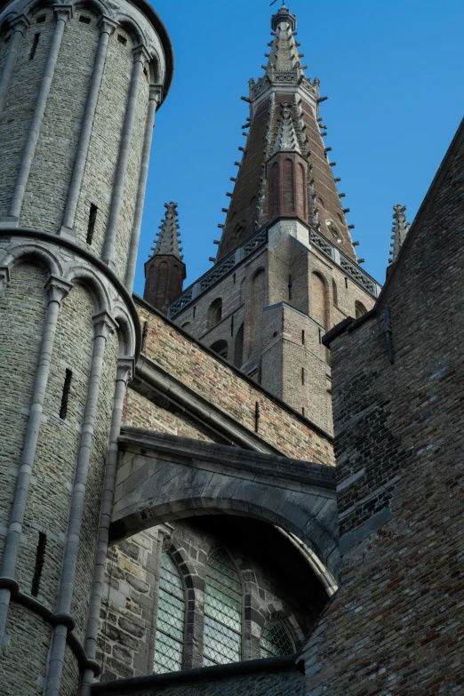 a large building with many towers with clocks