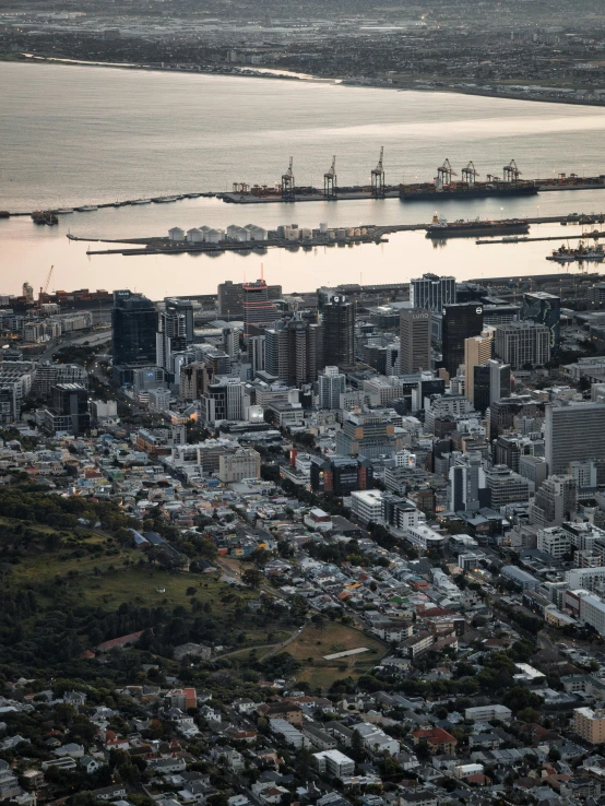 an aerial view of a city surrounded by water