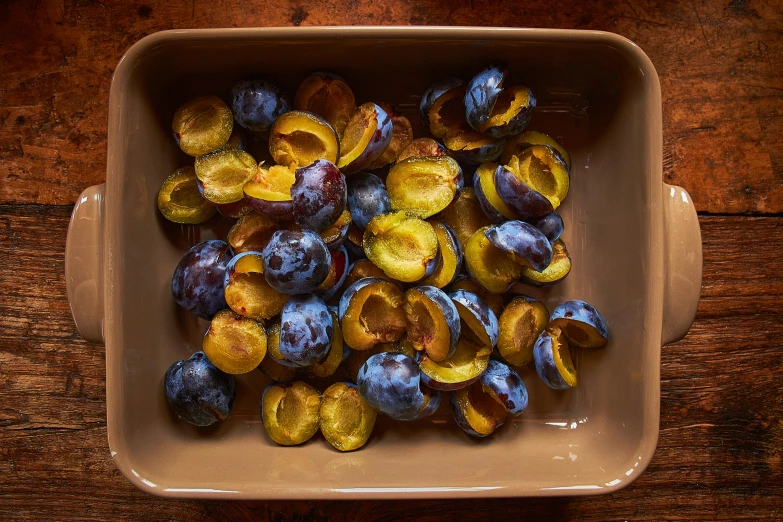 an overhead view of some baked potatoes in a pan