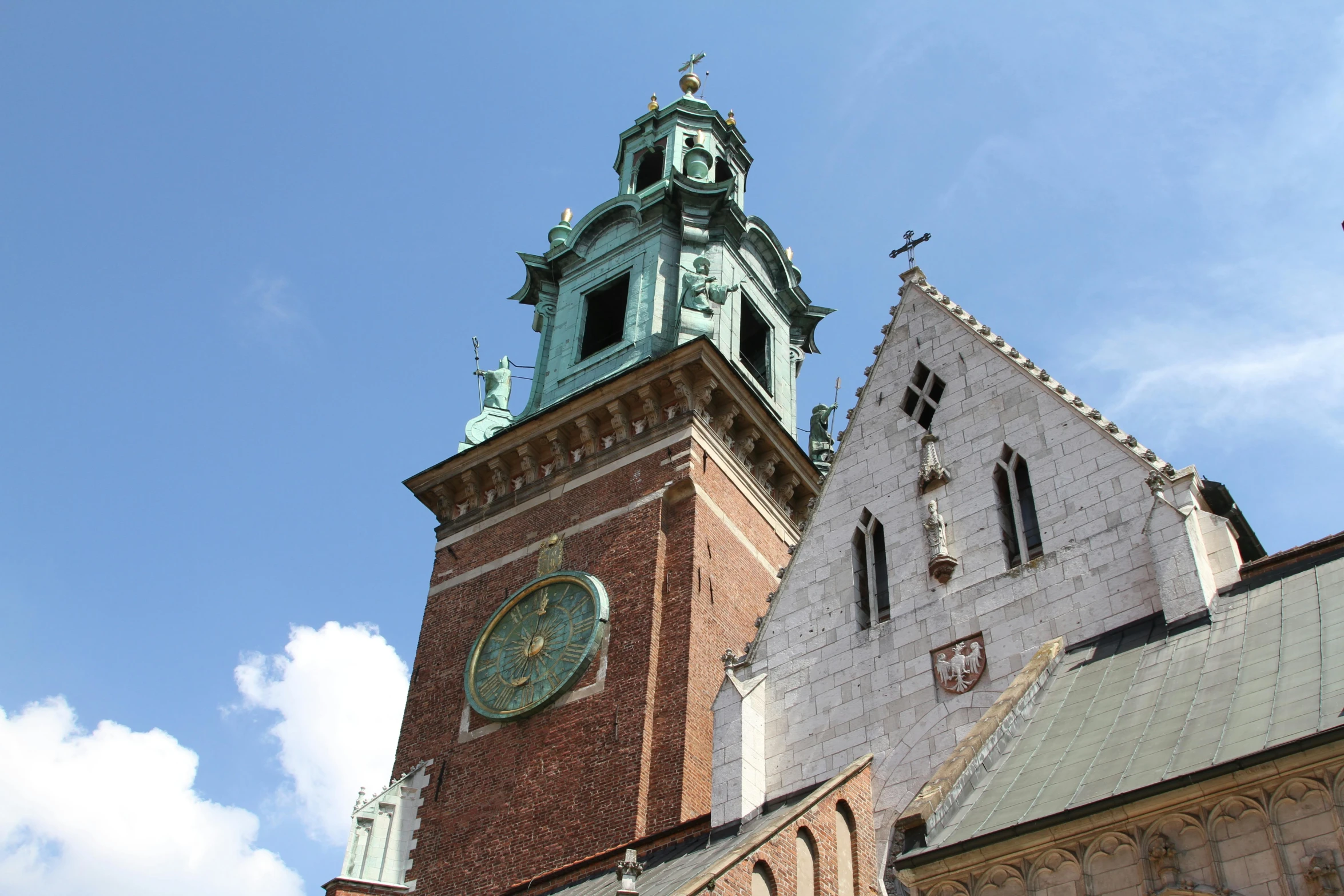 the large building has a clock and a tower on it