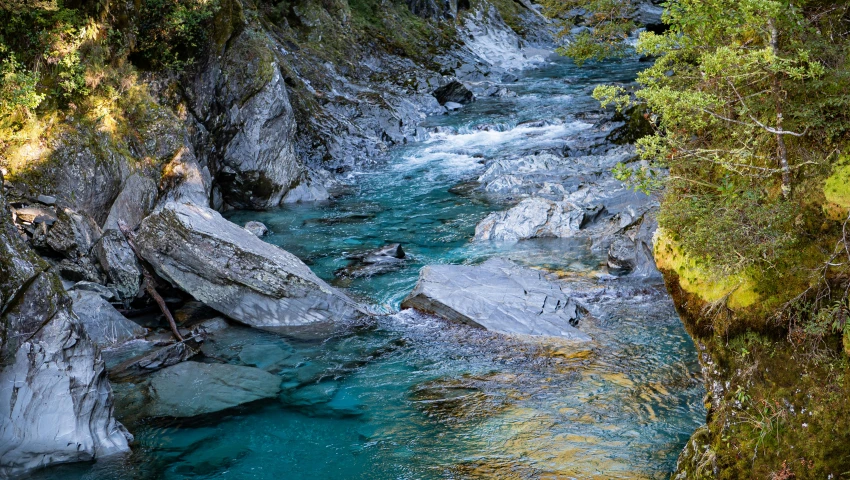 a rocky mountain stream in the middle of nowhere